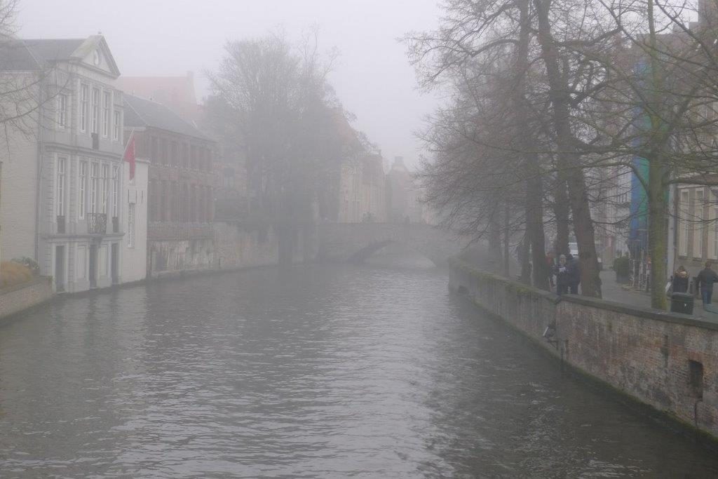 Bruges canal in the fog