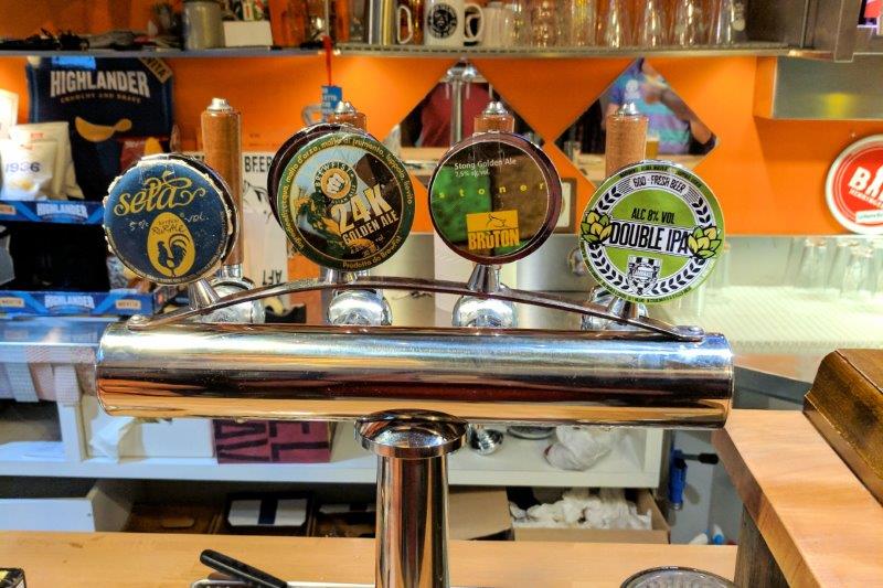 Tap handles of beer in Cervesia Tap Room