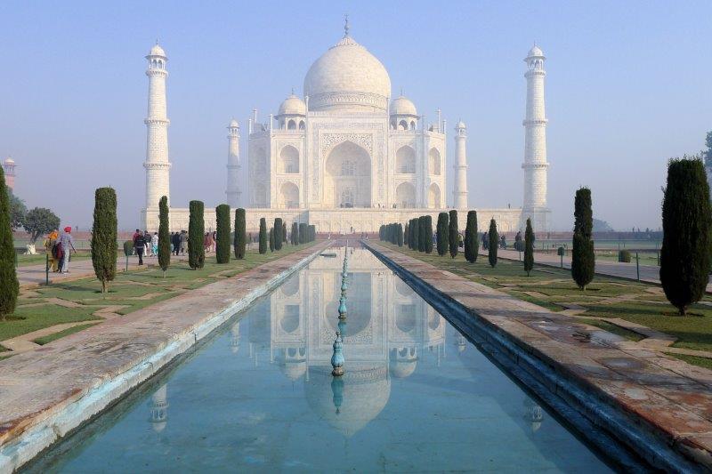 Taj reflected in the pools.