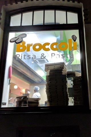 Window into Broccoli pizza